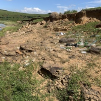 Rubbish littered on river bank