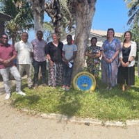 Image of group posing outside