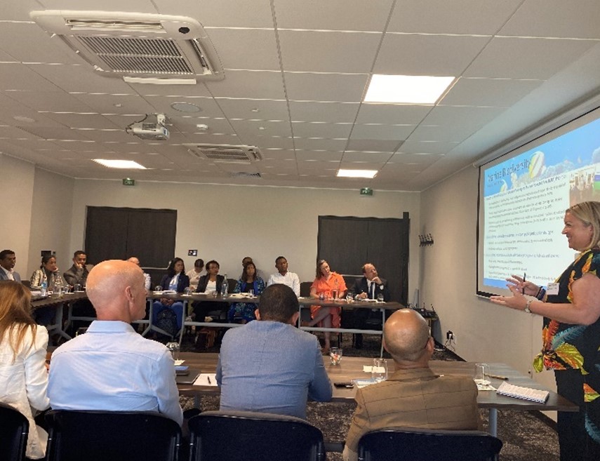 Image of group listening to presentation